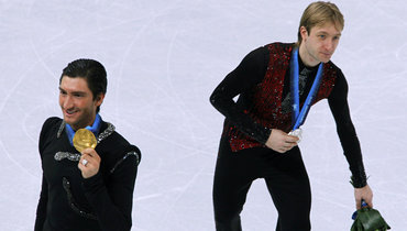 18 февраля 2010 года. Ванкувер. Эван Лайсачек и Евгений Плющенко.