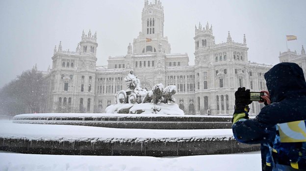 Снегопад в Мадриде. Фото AFP Снегопад в Мадриде. Фото AFP