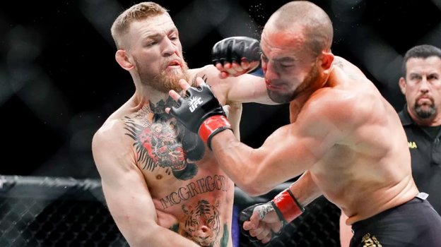 Конор Макгрегор и Эдди Альварес. Фото mmafighting.com Конор Макгрегор и Эдди Альварес. Фото mmafighting.com