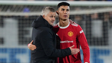 Уле Гуннар Сульшер и Криштиану Роналду.