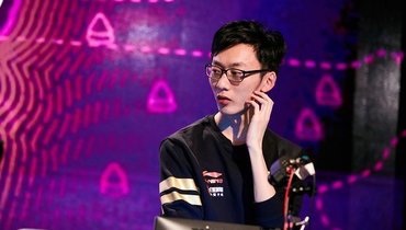 Жон Godking Люшай.