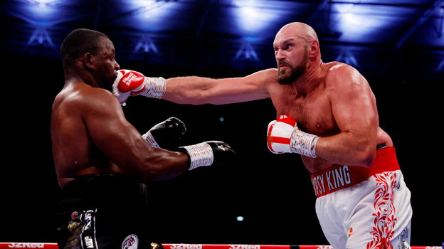 Тайсон Фьюри наносит удар Диллиану Уайту. Фото Reuters Тайсон Фьюри наносит удар Диллиану Уайту. Фото Reuters