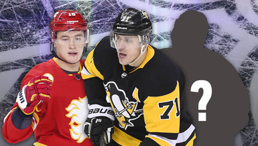 Евгений Малкин (в центре) и Никита Задоров.