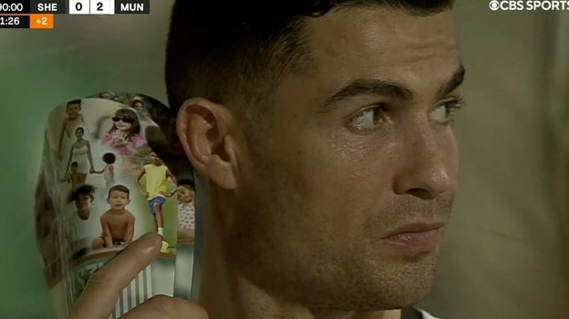 Криштиану Роналду и щитки с фотографиями его семьи. Фото ESPN FC, Twitter Криштиану Роналду и щитки с фотографиями его семьи. Фото ESPN FC, Twitter