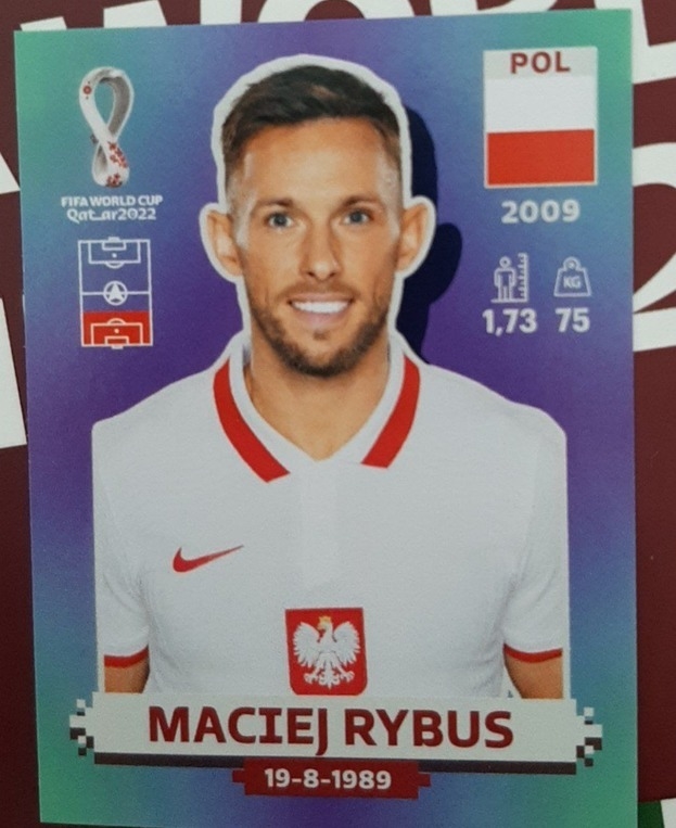 Наклейка с Мацеем Рыбусом в официальном альбоме ЧМ-2022. Наклейка с Мацеем Рыбусом в официальном альбоме ЧМ-2022.