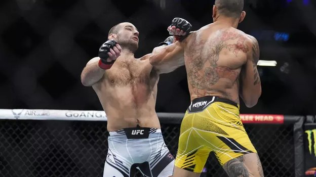 Алекс Перейра нокаутирует Шона Стриклэнда левым хуком. Фото Chris Unger/Zuffa LLC Алекс Перейра нокаутирует Шона Стриклэнда левым хуком. Фото Chris Unger/Zuffa LLC