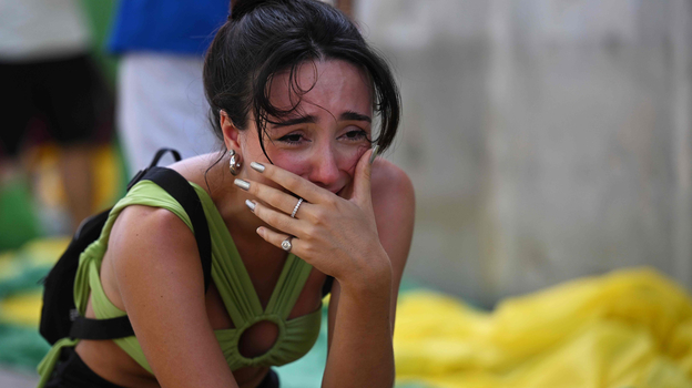 Болельщица сборной Бразилии после матча. Фото AFP Болельщица сборной Бразилии после матча. Фото AFP