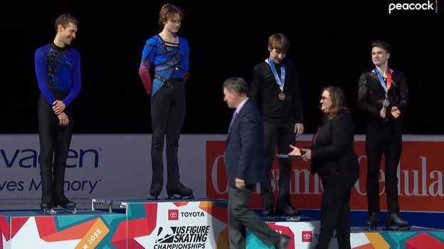 Максим Наумов (крайний справа) с оловянной медалью. Фото Скриншот трансляции NBC Максим Наумов (крайний справа) с оловянной медалью. Фото Скриншот трансляции NBC