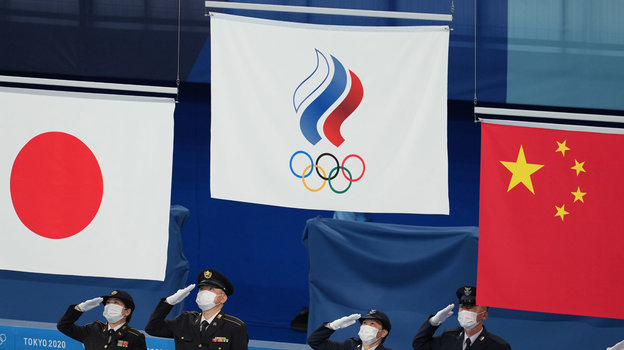 Флаги Японии, России и Китая на Олимпиаде в Токио. Фото Дмитрий Коротаев, Известия Флаги Японии, России и Китая на Олимпиаде в Токио. Фото Дмитрий Коротаев, Известия