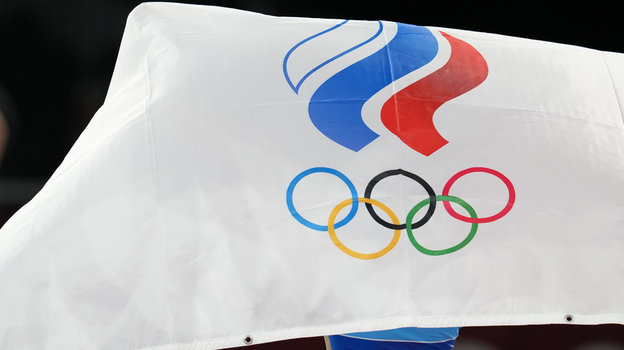 Флаг ОКР на Олимпийских играх. Фото Дмитрий Коротаев, Известия Флаг ОКР на Олимпийских играх. Фото Дмитрий Коротаев, Известия