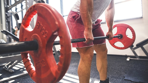 Тренировка со штангой. Фото istockphoto.com Тренировка со штангой. Фото istockphoto.com