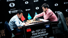 Шахматисты Ян Непомнящий и Дин Лижэнь.