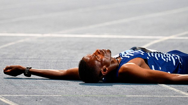 Реакция Ламехи Гирмы на свой рекорд. Легкоатлет Ламеха Гирма.