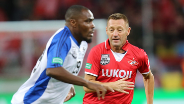 Эммануэль Эменике и Андрей Тихонов.