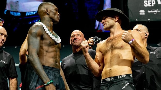 Исраэль Адесанья и Шон Стрикленд.