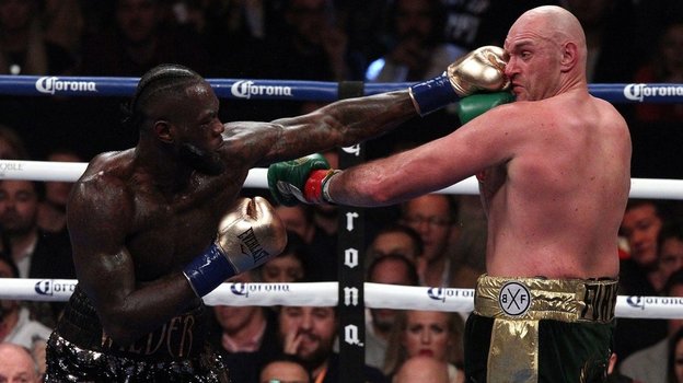 Тайсон Фьюри (справа) и Деонтей Уайлдер. Боксеры Деонтей Уайлдер и Тайсон Фьюри.