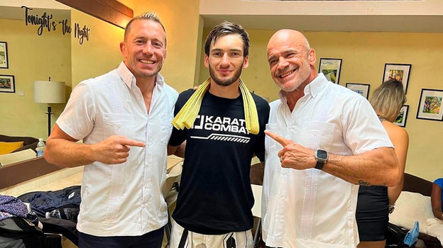 Жорж Сен-Пьер (слева), Мырза-Бек Тебуев (в центре).