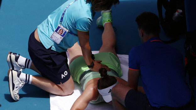 Элина Свитолина и физиотерапевт.