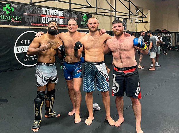 Кристофер Кертис, Шон Стрикленд, Сергей Романов и Элай Аронов.