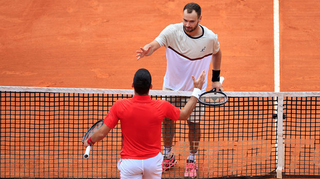 Роман Сафиуллин и Новак Джокович. Теннисисты Роман Сафиуллин и Новак Джокович