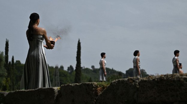 Церемония зажжения олимпийского огня.