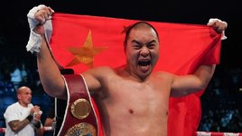Взял серебро Олимпиады, научился варить рис в США и избил Уайлдера. Кто такой Чжан Чжилей