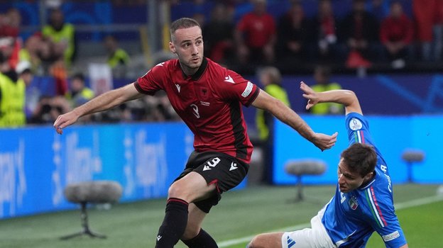 Марио Митай.