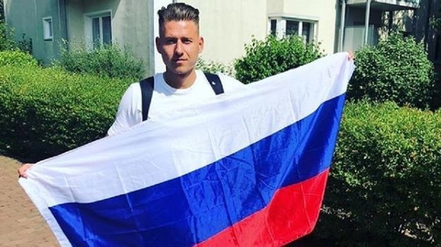 Вальдемар Антон с российским флагом.