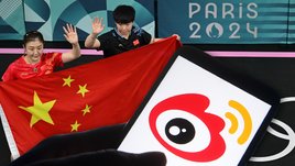 Игроки в настольный теннис Чэнь Мэн и Сунь Иньша