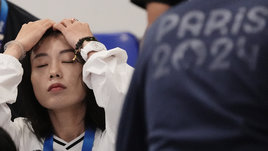 Кореянка упала в обморок после возвращения из Парижа. На Олимпиаде ее прозвали «улыбающейся убийцей»
