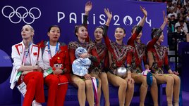 «Тренировки веду на китайском». Русская суперзвезда помогла гимнасткам из КНР стать чемпионками