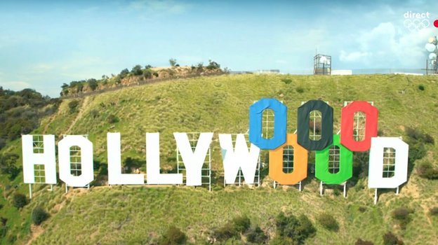 Знак Hollywood на Голливудских холмах, стилизованный под олимпийские кольца.