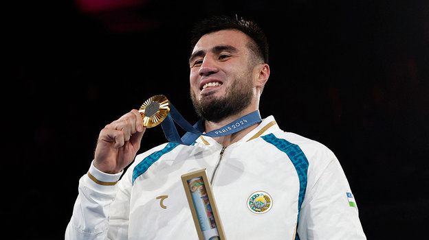 Баходир Джалолов с золотой медалью.