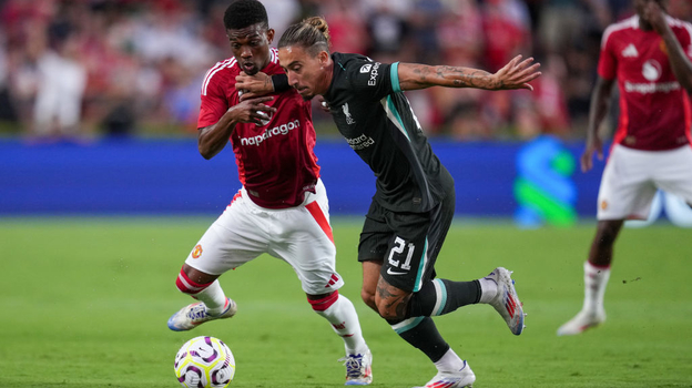 Амад Диалло и Костас Цимикас.