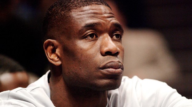 Дикембе Мутомбо в молодости.