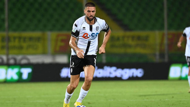 Марко Курто.