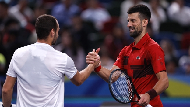 Роман Сафиуллин и Новак Джокович.