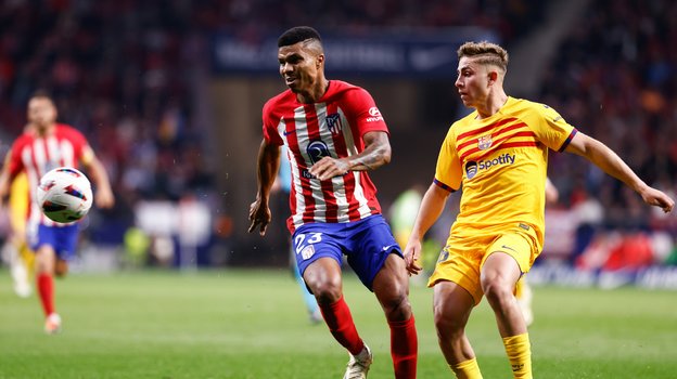 Рейнилду Мандава («Атлетико») и Фермин Лопес («Барселона»).