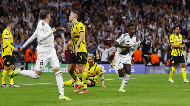 Нападающий «Реала» Винисиус (№7) празднует гол в матче с «Боруссией». Нападающий «Реала» Винисиус (№7) празднует гол в матче с «Боруссией»