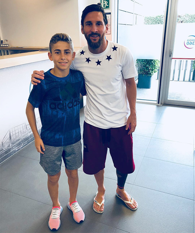 Фермин Лопес с Лионелем Месси.