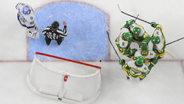 Кирилл Капризов (№ 97) с одноклубниками празднует гол в ворота «Тампа-Бэй»