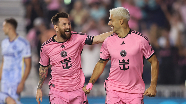 Лионель Месси и Луис Суарес.