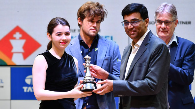 Шахматистка Александра Горячкина, Магнус Карлсен (в центре) и Вишванатан Ананд. Шахматистка Александра Горячкина, Магнус Карлсен (в центре) и Вишванатан Ананд