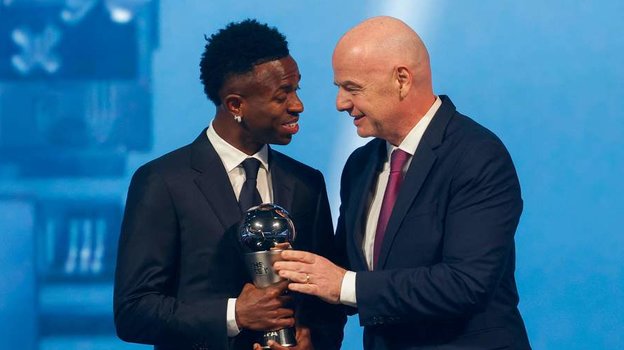 Винисиус Жуниор и Джанни Инфантино.