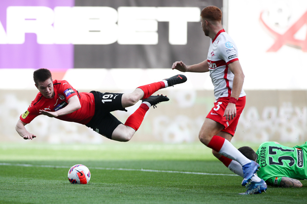 Александр Руденко, Максимилиано Кофрие и Александр Селихов. Футболисты Александр Руденко, Максимилиано Кофрие и Александр Селихов в матче «Химки» — «Спартак» (2:1). 21 мая 2022 года. Химки