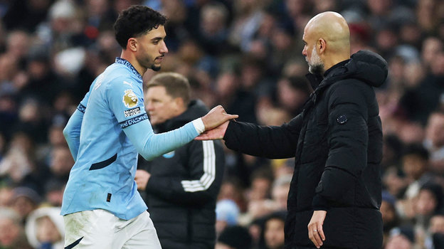 Омар Мармуш и Хосеп Гвардиола. Нападающий «Манчестер Сити» Омар Мармуш и главный тренер Хосеп Гвардиола
