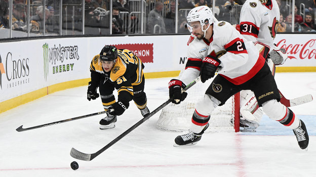 Мэттью Пойтрас и Артем Зуб. Хоккеисты Мэттью Пойтрас и Артем Зуб в матче НХЛ «Бостон» — «Оттава»