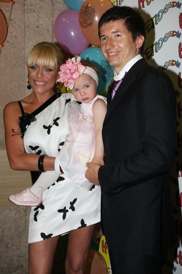 Юлия Началова и Евгений Алдонин с дочерью.