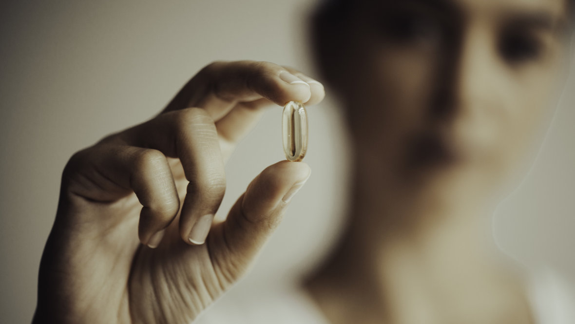 Капсула в пальцах