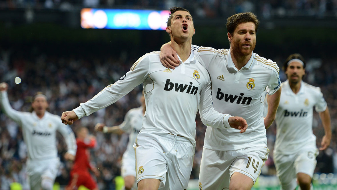 Криштиану Роналду и Хаби Алонсо. Футболисты Криштиану Роналду и Хаби Алонсо «Реале». 2012 год